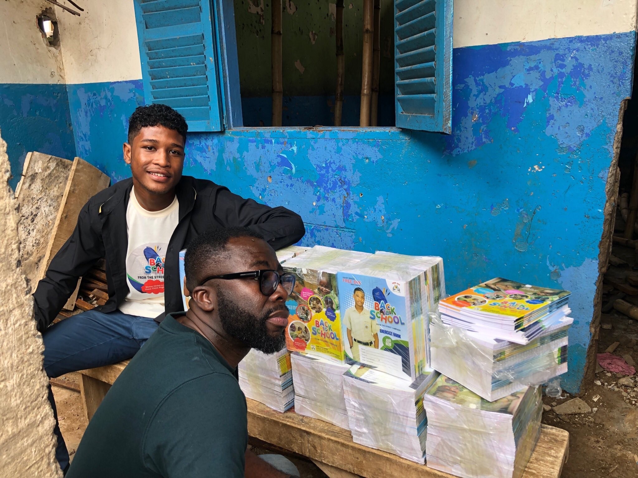 FREE SHS AMBASSADOR AND DAD MAKE DONATION TO SOME SCHOOL CHILDREN